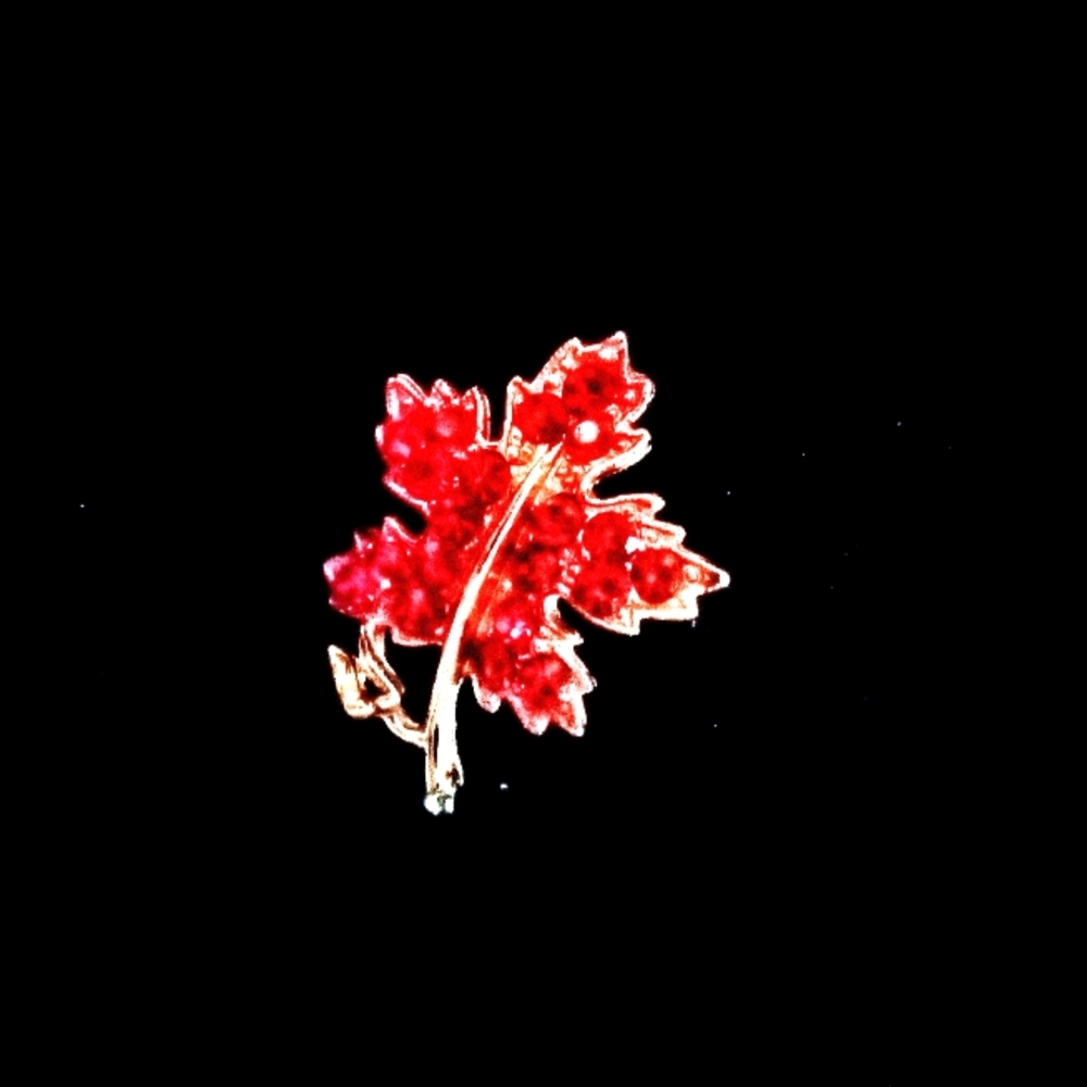 Vtg Maple Leaf pin with sparkling pink rhinestones